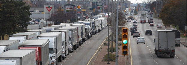 Long line of trucks northbound Huron Church Road. Photo : Dan Janisse / The Windsor Star