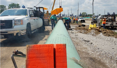 A blue gas pipeline is moved